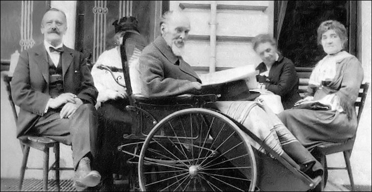 Carl Fabergé in Wheelchair with His Wife Auguste Fabergé (far right), Wiesbaden, 1918 (von Habsburg, Géza. Fabergé, 1986, 30)