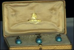 Discovery of a Fabergé necklace with sky blue pendant eggs in an original hollywood case valued at 12,000 GBP.