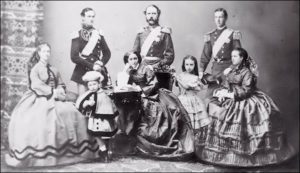 1862: Future King Christian IX of Denmark, His Wife Louise of Hesse-Kassel and Their Six Children at the Time of Princess Alexandra's Engagement to the Prince of Wales. Left to right: Dagmar, Frederick, Waldemar, Louise (Later Queen), Christian (Later King), Thyra, William, and Alexandra. (Aronson, Theo, A Family of Kings, The Descendants of Christian IX of Denmark, 1976, facing p. 116)