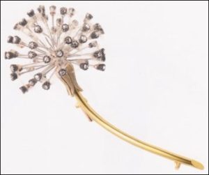 Gold, Asbestos, and Diamonds Dandelion Pin by Fabergé, ca. 1900 (Courtesy Wartski)