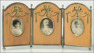 (A) Silver and Wood Triptych Photograph Frame, Workmaster Antti Nevalainen, 1899-1904 (Courtesy Christie's, New York)