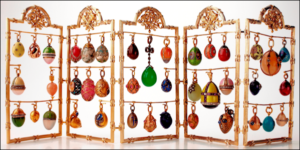 Folding Screen with Fabergé and Other Pendant Eggs (Courtesy Photograph © David Hall, Hessischen Hausstiftung, Eichenzell, Germany)